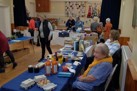 Valerie and Jill manning their tables